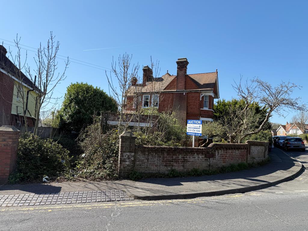 Lot: 62 - SUBSTANTIAL DETACHED PROPERTY AND LAND WITH POTENTIAL - View from road showing garage
